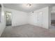 Spacious bedroom with carpet, and access to bathroom at 3855 S Monaco St # 176, Denver, CO 80237