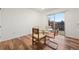 Dining area with glass table and chairs, near kitchen and sliding door at 3855 S Monaco St # 176, Denver, CO 80237