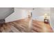 Spacious living room featuring hardwood floors and an open floor plan at 3855 S Monaco St # 176, Denver, CO 80237