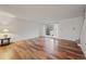 Bright living room with hardwood floors and a view of the backyard at 3855 S Monaco St # 176, Denver, CO 80237