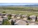 Picturesque aerial view of homes with stunning views of the mountains and open space at 3418 Oak Leaf Pl, Highlands Ranch, CO 80129
