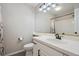 Classic bathroom with a vanity, tile countertop, and shower with curtain at 3418 Oak Leaf Pl, Highlands Ranch, CO 80129