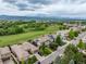 Neighborhood aerial view with golf course nearby at 8993 Stonecrest Way, Highlands Ranch, CO 80129