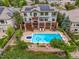 Aerial view of backyard with pool, deck, and patio at 8993 Stonecrest Way, Highlands Ranch, CO 80129