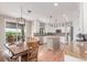Bright, modern kitchen with stainless steel appliances and a center island at 8993 Stonecrest Way, Highlands Ranch, CO 80129