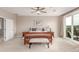 Bright main bedroom featuring a door to a balcony with scenic views at 8993 Stonecrest Way, Highlands Ranch, CO 80129