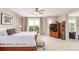 Spacious main bedroom features a balcony with scenic mountain views at 8993 Stonecrest Way, Highlands Ranch, CO 80129