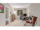 Bright home office with comfortable seating area and natural light at 8993 Stonecrest Way, Highlands Ranch, CO 80129