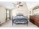 Serene bedroom with vaulted ceilings, a ceiling fan, and a cozy ambiance at 1911 S Hannibal St # H, Aurora, CO 80013