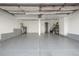 Spacious garage with sealed concrete flooring, ready for projects and storage at 1911 S Hannibal St # H, Aurora, CO 80013