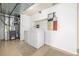 Laundry room features a washer, dryer and utilitarian decor at 1911 S Hannibal St # H, Aurora, CO 80013