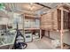 Functional basement area with storage shelves, a utility sink, and a secure safe at 1000 N Logan St, Denver, CO 80203