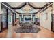 Elegant conference room with coffered ceilings, a large table, and wood-paneled walls at 1000 N Logan St, Denver, CO 80203