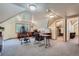 Another view of the bright office space, revealing ample space with natural light and a sloped ceiling at 1000 N Logan St, Denver, CO 80203
