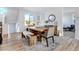 Rustic-modern dining area with wood table and bench seating at 11728 Octave Ave, Lone Tree, CO 80134