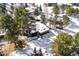 Aerial view of a home nestled in a snow-covered neighborhood at 1228 Pomegranate Ln, Golden, CO 80401