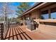 Spacious deck features a grill and overlooks the trees at 1228 Pomegranate Ln, Golden, CO 80401