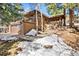 House exterior showcasing a deck and walkway leading to the garage at 1228 Pomegranate Ln, Golden, CO 80401