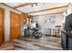 Bright home office features built-in shelving and hardwood floors at 1228 Pomegranate Ln, Golden, CO 80401