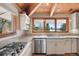 Kitchen with stainless steel appliances and mountain views at 1228 Pomegranate Ln, Golden, CO 80401