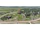 Aerial view of property with lush greenery, scattered homes, and winding roads in a rural setting at 19336 Queens Crescent Way, Monument, CO 80132