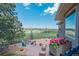 Backyard with outdoor seating, patio, and a view of the expansive grassy yard and neighborhood beyond at 19336 Queens Crescent Way, Monument, CO 80132