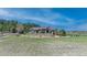 Picture of home exterior with well-manicured landscaping and a grand entryway at 19336 Queens Crescent Way, Monument, CO 80132