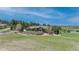 Beautifully landscaped front yard with a retaining wall enhances the curb appeal of this attractive home at 19336 Queens Crescent Way, Monument, CO 80132