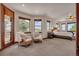 Spacious main bedroom with chairs, windows and amazing views at 19336 Queens Crescent Way, Monument, CO 80132