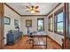 Spacious office with hardwood flooring, wood trim windows, and natural light at 19336 Queens Crescent Way, Monument, CO 80132