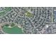 Aerial view of neighborhood with nearby parks, lake, and shopping centers at 6087 W 84Th Ave, Arvada, CO 80003