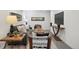 Finished basement with cozy seating, soft lighting, and decorative accents at 6087 W 84Th Ave, Arvada, CO 80003