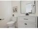Modern half bath features new vanity and fixtures, perfect for guests at 6087 W 84Th Ave, Arvada, CO 80003