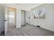 Bedroom with new carpet, closet with mirrored doors, and natural light at 6087 W 84Th Ave, Arvada, CO 80003