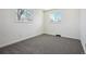 Bedroom with new carpet and two windows allowing for plenty of natural light at 6087 W 84Th Ave, Arvada, CO 80003