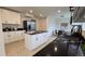 Contemporary kitchen with island, white cabinets and black granite countertops at 6087 W 84Th Ave, Arvada, CO 80003