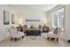 Bright and airy living room with neutral decor, bay window, and stylish furnishings at 6087 W 84Th Ave, Arvada, CO 80003