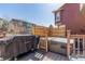 Grill and hot tub on spacious back deck with privacy screen for relaxation and outdoor enjoyment at 10438 Olathe Way, Commerce City, CO 80022