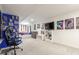 Finished basement featuring space for gaming and a bedroom area at 10438 Olathe Way, Commerce City, CO 80022