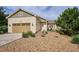 Charming home with a well-manicured lawn and a two-car garage, creating great curb appeal at 5603 Van Bibber Ct, Golden, CO 80403
