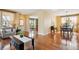 Open-concept living and dining areas with hardwood floors provide an airy and inviting space at 5603 Van Bibber Ct, Golden, CO 80403