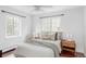 Cozy bedroom featuring natural light, a comfortable bed and stylish nightstands at 2895 S Sherman St, Englewood, CO 80113