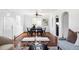Bright living room featuring dining area, hardwood floors, and stylish furniture at 2895 S Sherman St, Englewood, CO 80113