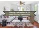 Elegant living room featuring modern furniture, hardwood floors and a ceiling fan at 2895 S Sherman St, Englewood, CO 80113