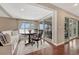 Cozy dining area with bench seating and a round table, near a window overlooking the yard at 4650 E Links Pkwy, Centennial, CO 80122