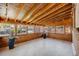 Spacious sunroom featuring wood walls, a planked ceiling, and lots of windows at 903 Poplar St, Denver, CO 80220