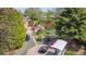 Landscaped backyard featuring a brick patio with a fire pit and an outdoor dining set, perfect for entertaining at 998 S Leyden St, Denver, CO 80224