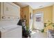 Laundry room with washer and dryer at 998 S Leyden St, Denver, CO 80224