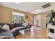 Inviting living room with large windows, cozy seating, and stylish decor at 998 S Leyden St, Denver, CO 80224