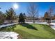 Landscaped backyard with putting green at 1429 S Grand Baker Cir, Aurora, CO 80018